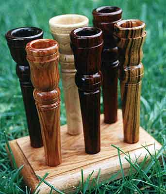 Mouthpieces in Exotic Hardwoods: (clockwise from front) Tulipwood, Zircote, Lilac, Cocobola, Zebrawood, Vietnamese Rosewood)